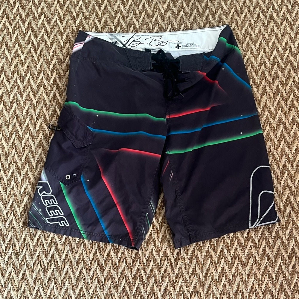 Vintage Board Shorts Reef Black and Blue Board Shorts with Dynamic Stripes